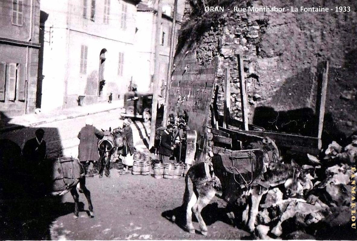 2839- Oran - Rue Monthabor - Fontaine - 1933.jpg